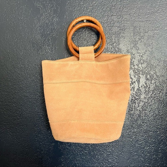 Suede bucket bag with wooden handles